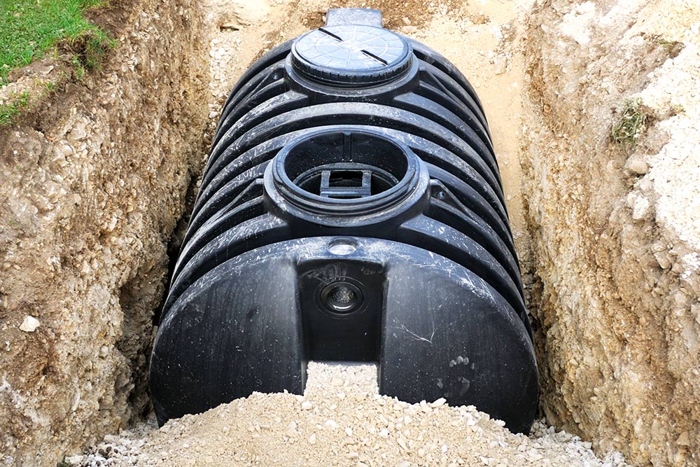Black Septic Tank — Parkton, NC — J & L Septic Tank Services A septic tank installation in progress in Cumberland, NC