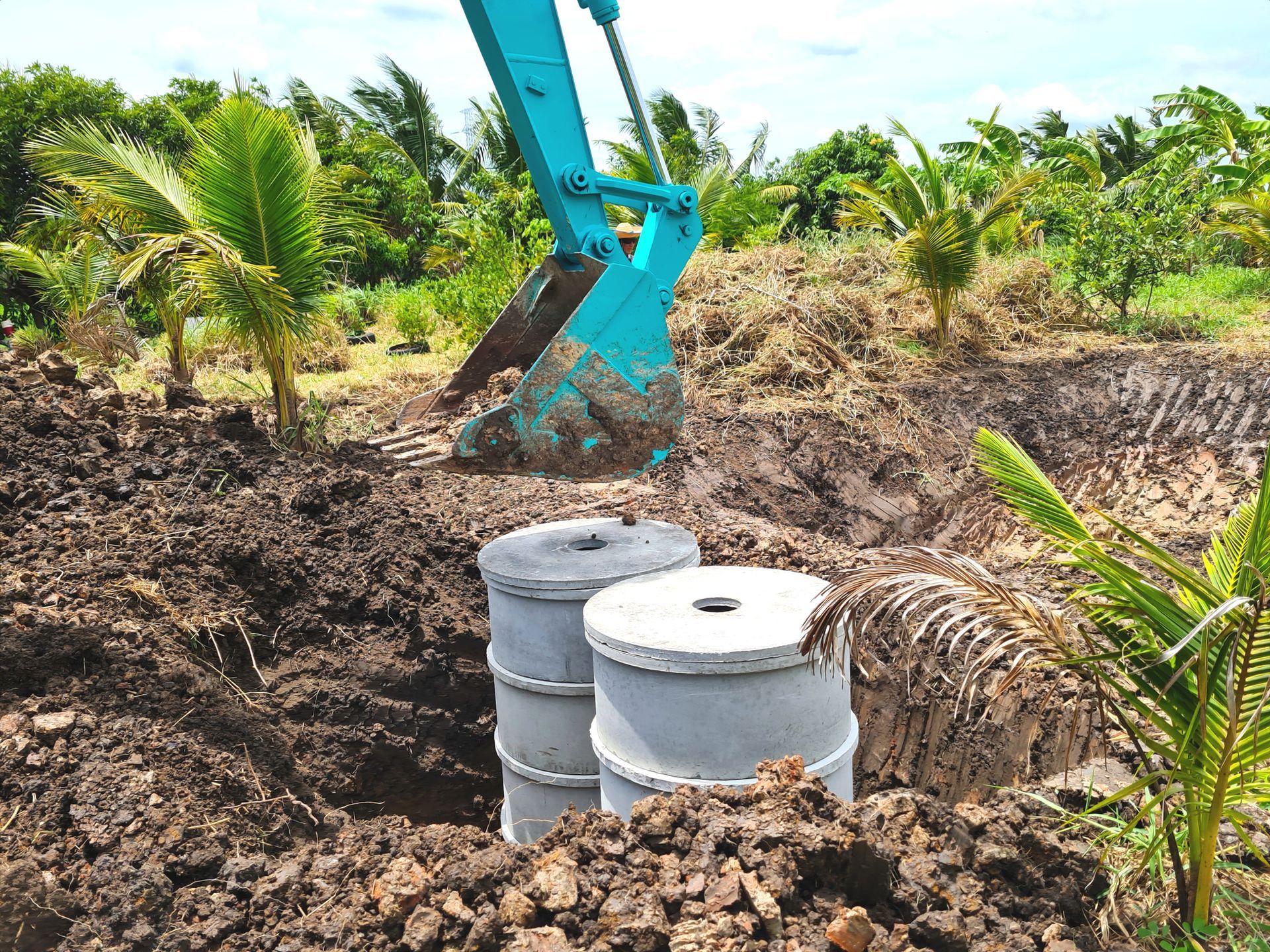 Installation of an underground concrete septic tank.