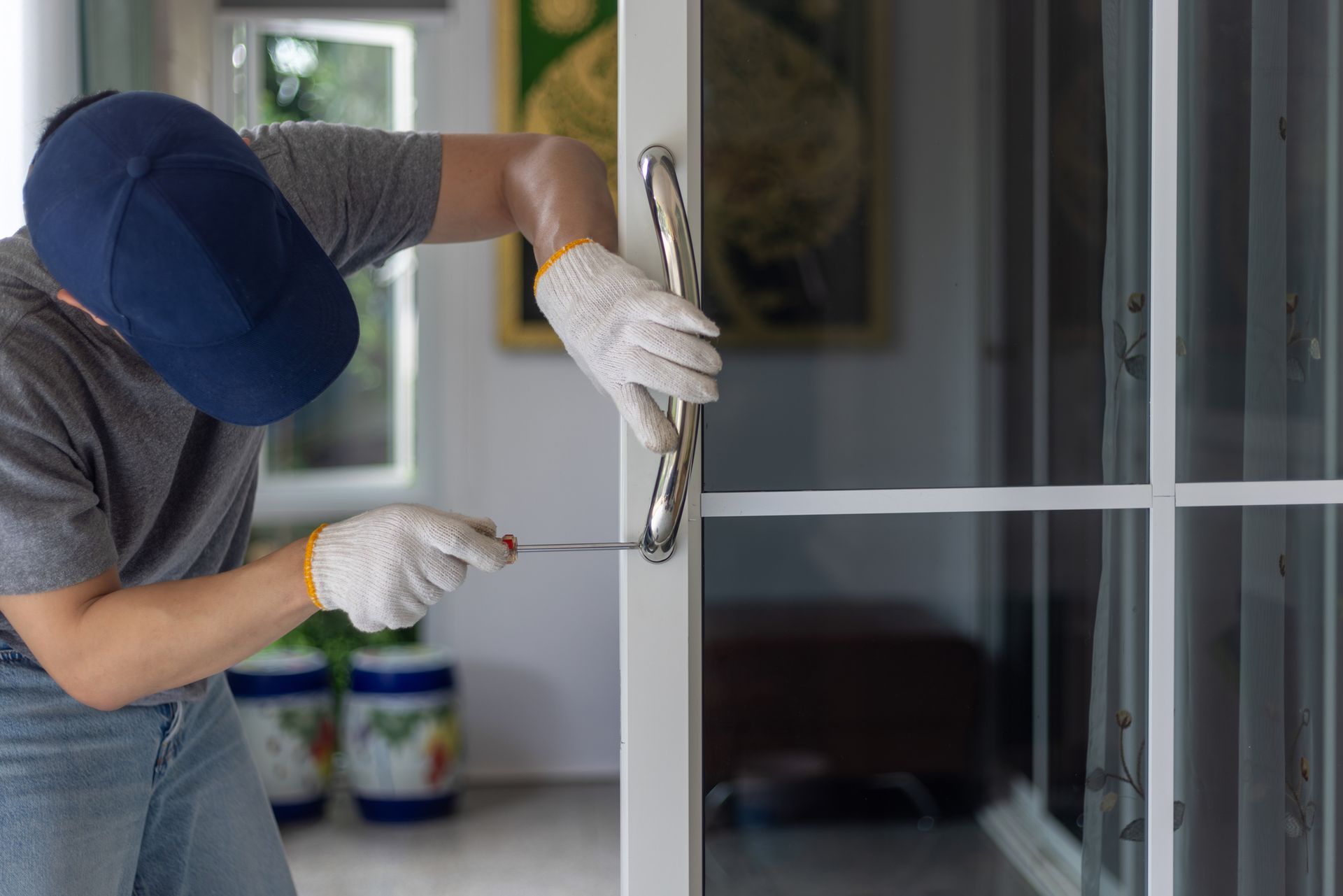 Repairing a door handle.