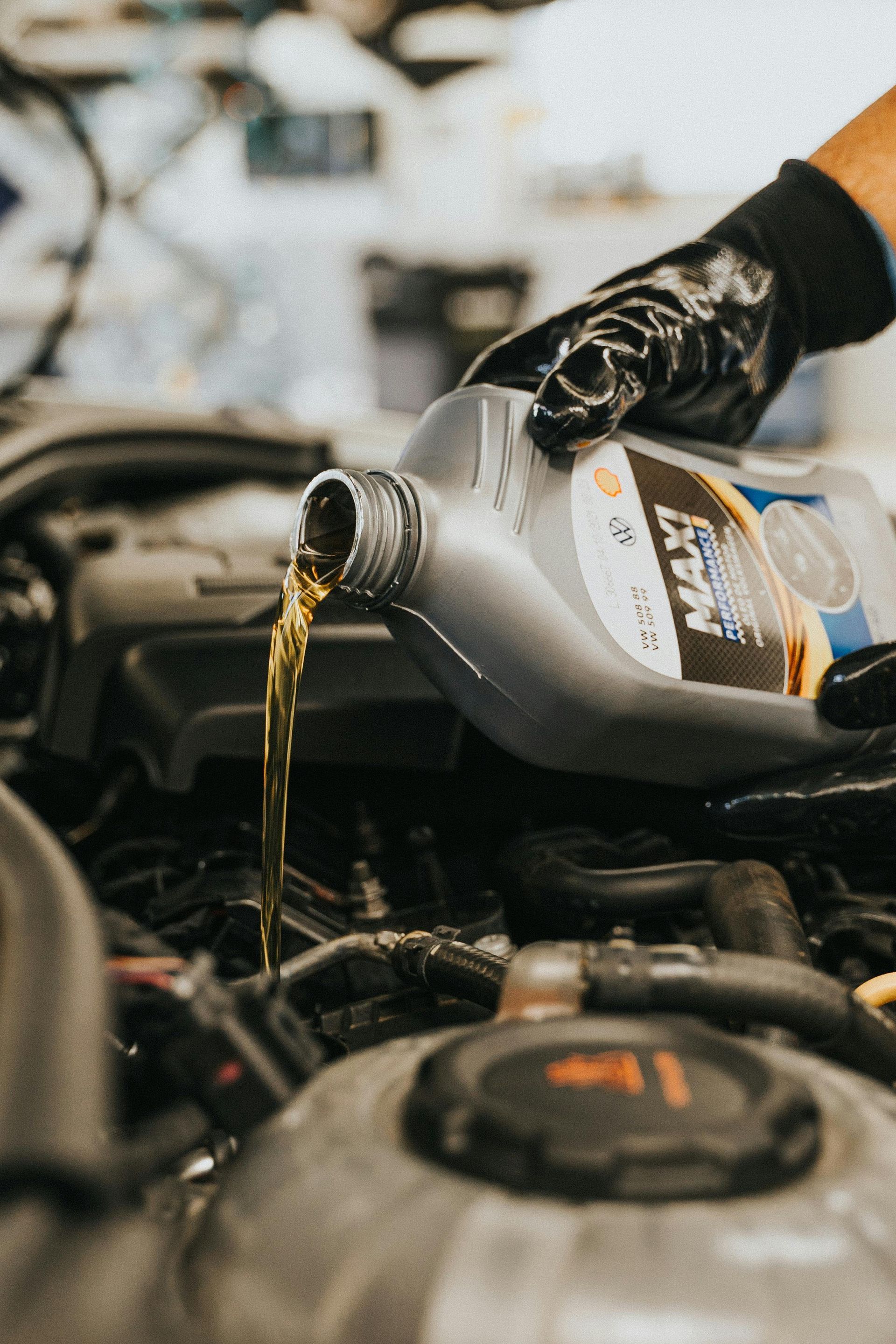 Oil being changed in a car