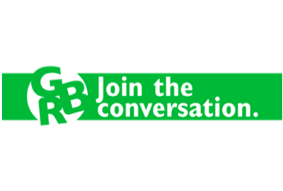A green sign that says join the conversation on it