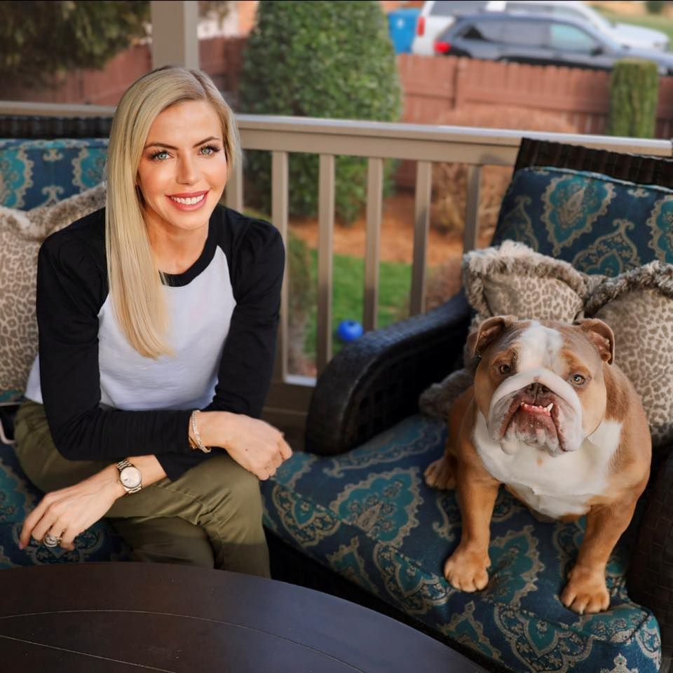 Woman business owner with her dog featured in Octo Strategies' Women Owned Businesses spotlight