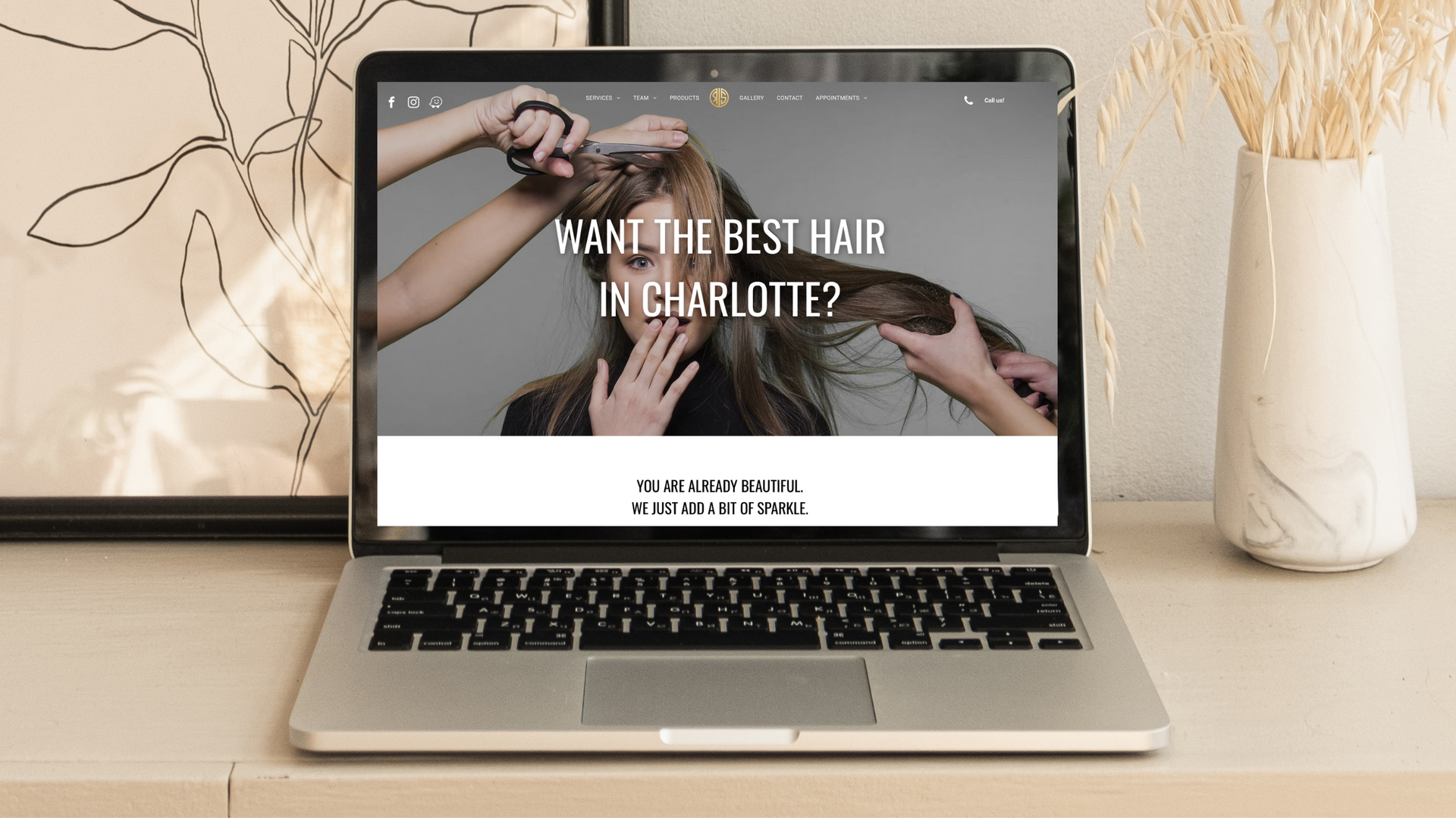 A laptop computer is open to a website that says `` want the best hair ? charlotte ''.