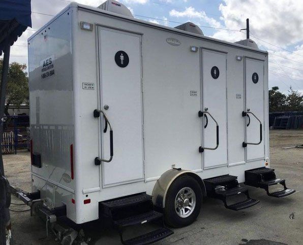 Side View of Restroom Trailer — Miami, FL — A.E.S. Portable Sanitation, Inc.