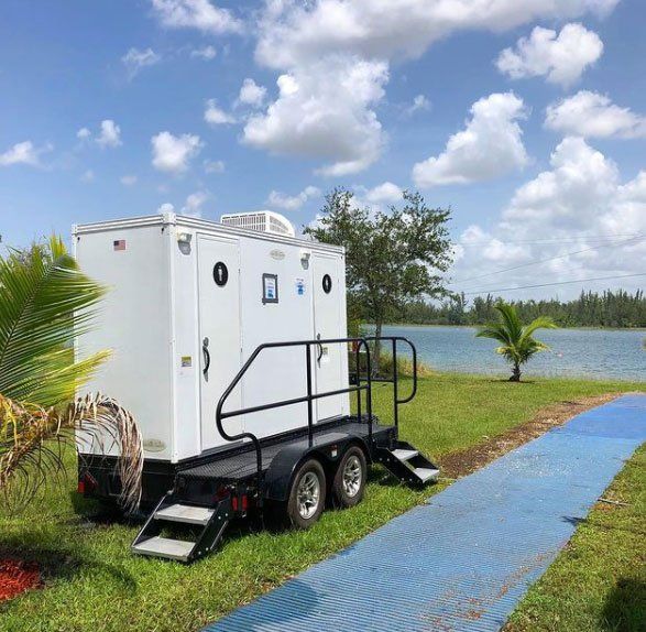 White Restroom Trailer — Miami, FL — A.E.S. Portable Sanitation, Inc.