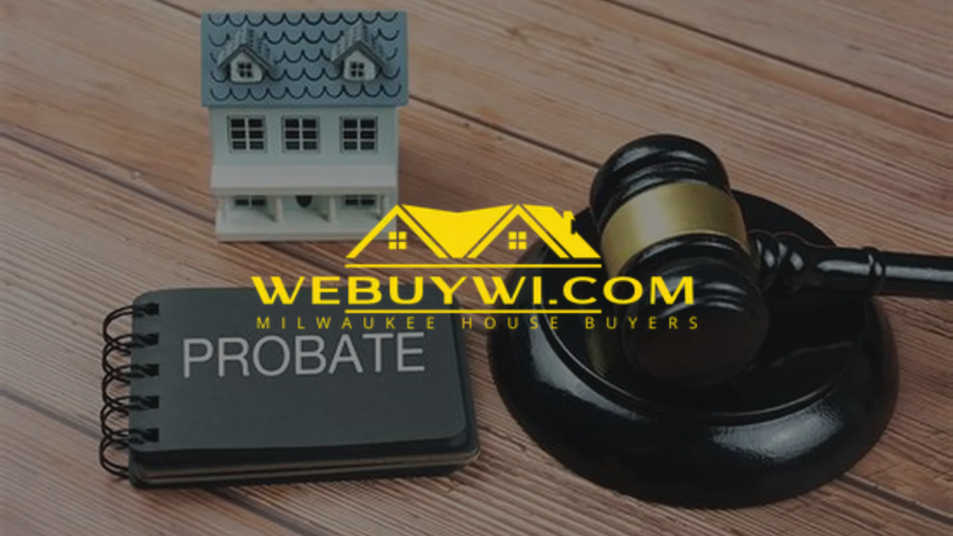 Probate concept: gavel, miniature house, notepad with