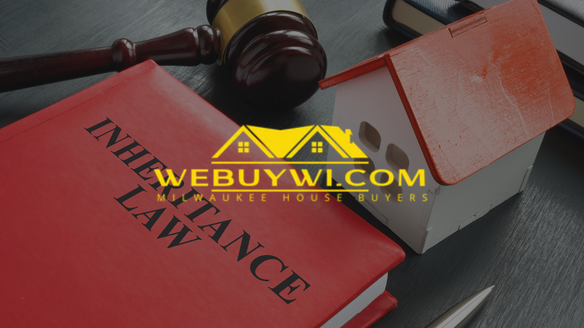 Red inheritance law book and gavel next to a miniature house, symbolizing legal estate transfer.
