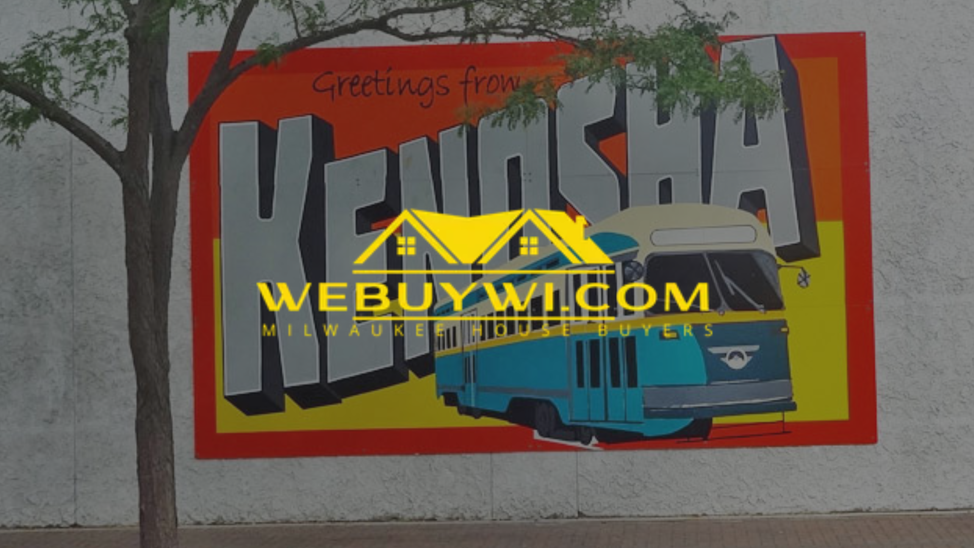 Mural on a wall saying