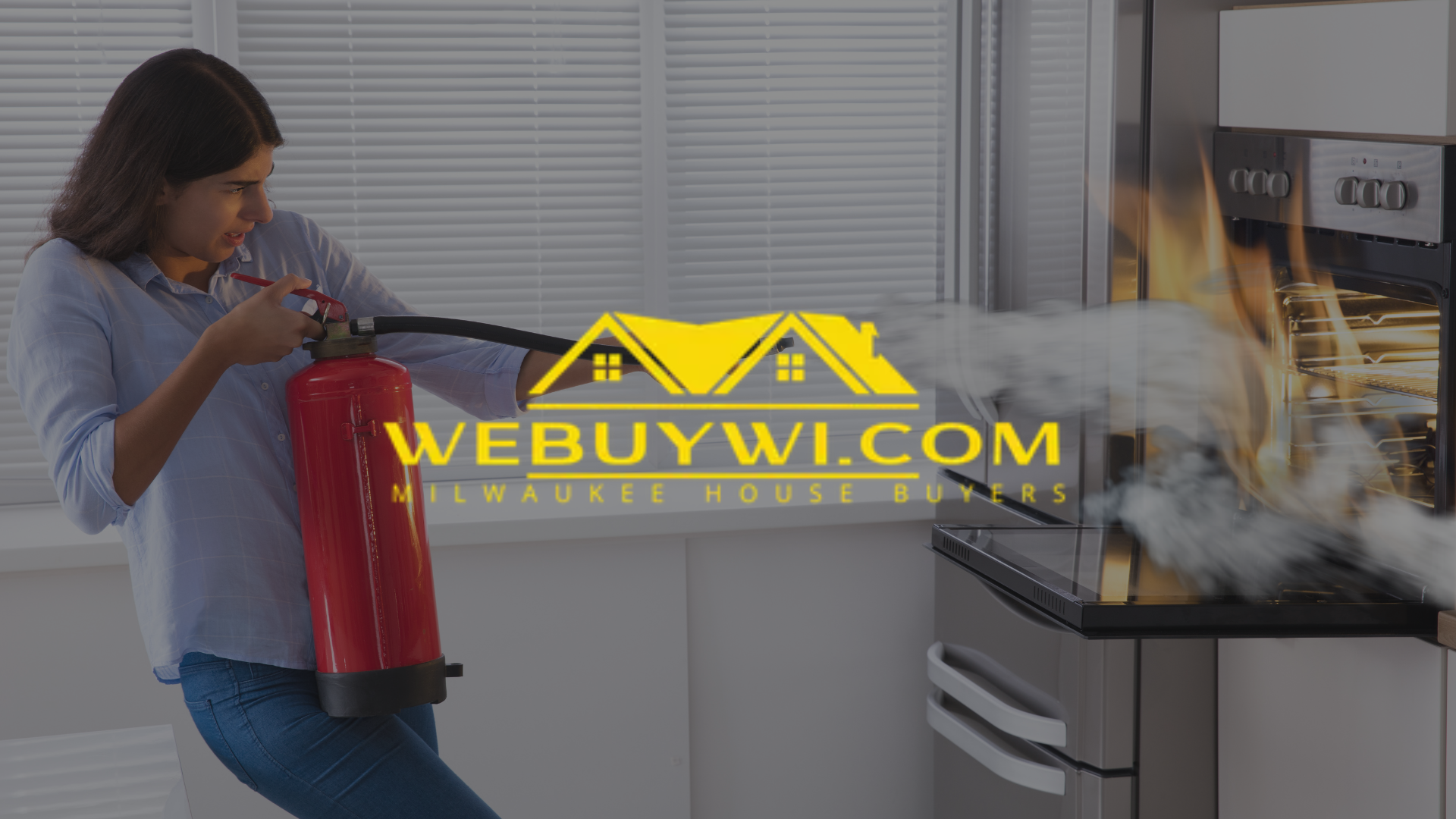 Woman using fire extinguisher on burning oven in a kitchen.