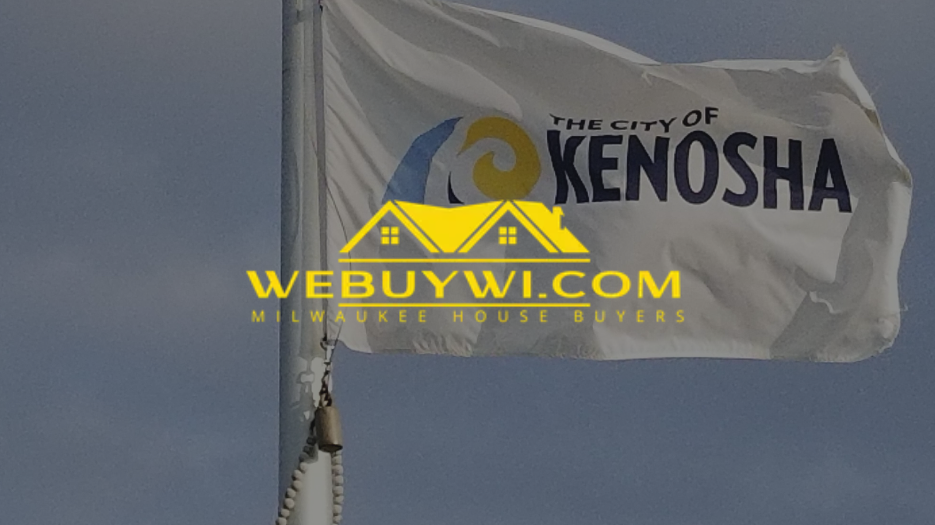 Kenosha city flag waving, partially obscuring the