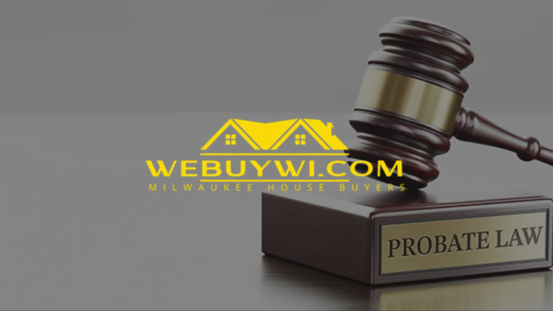 A gavel on a block labeled