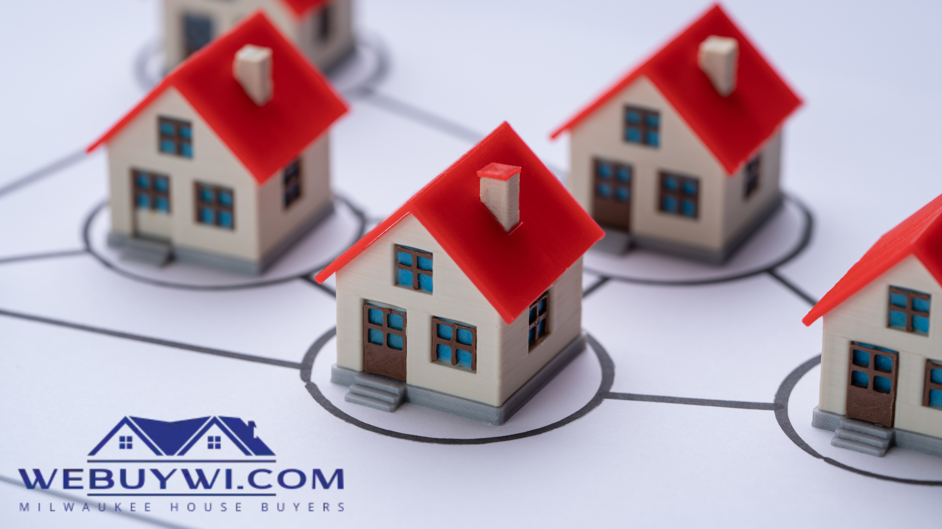 A group of houses are connected to each other with a webbuywi.com logo in the corner