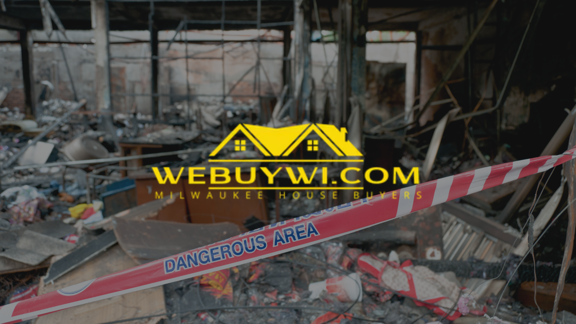 Fire-damaged building with caution tape;