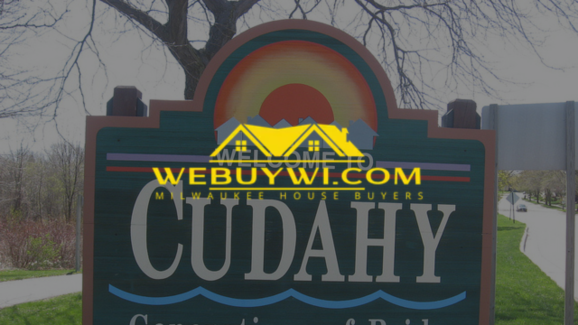 Sign for Cudahy, WI with a sun design.