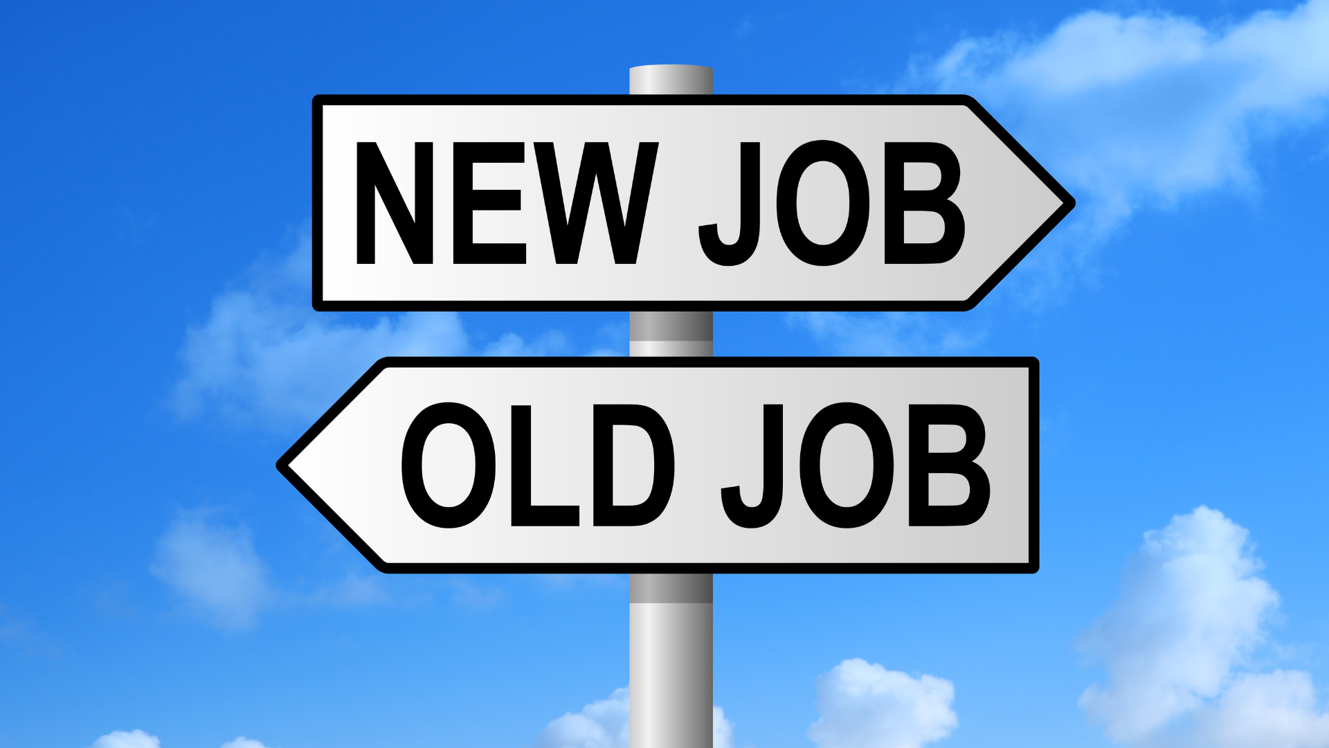 Directional signs reading “NEW JOB” and “OLD JOB” on a post against a blue sky.