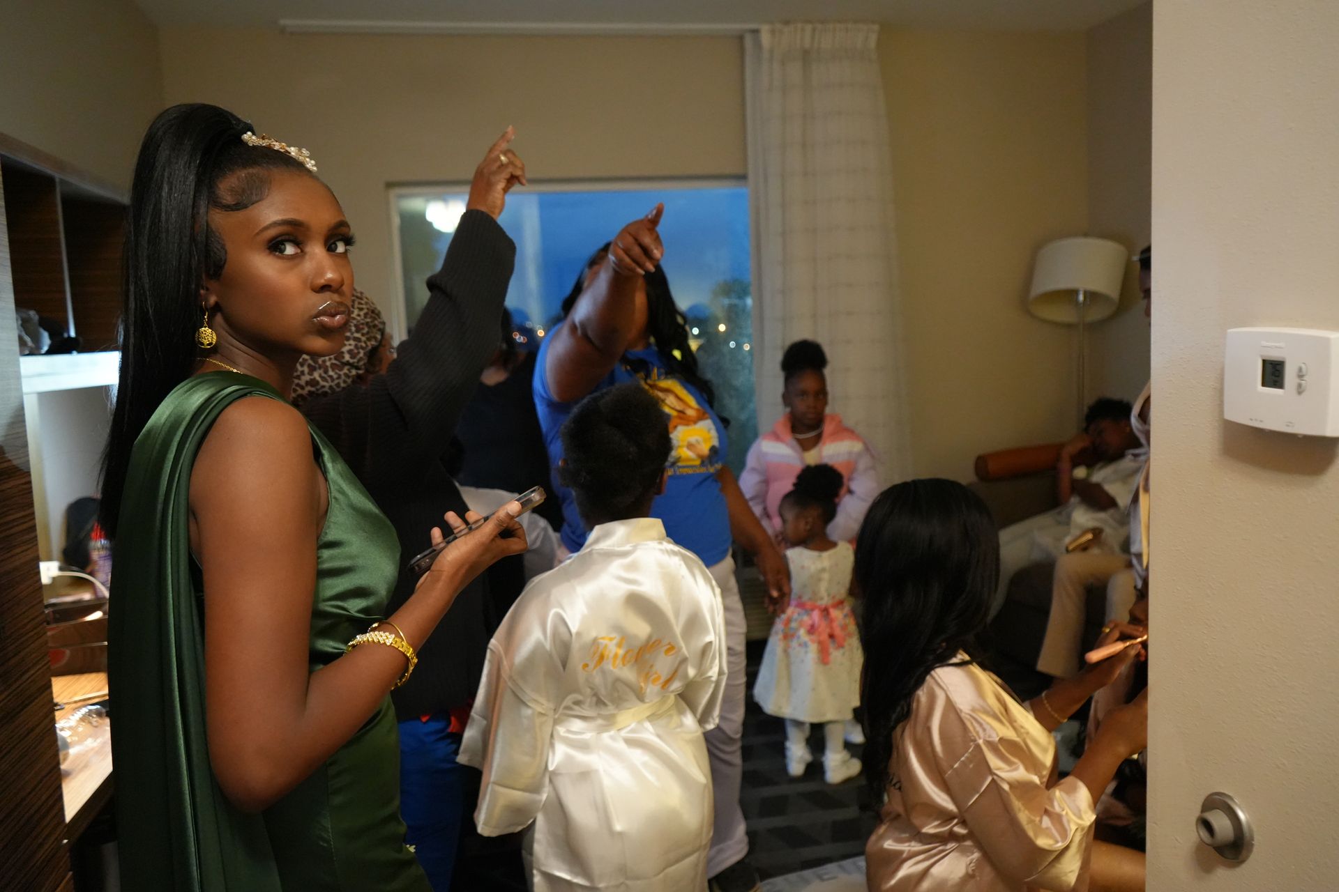 A group of women are standing in a room.