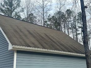 A before photo of a roof cleaning job in Gloucester, VA