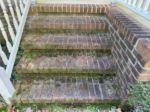 A before photo of a brick staircase cleaning job in Gloucester, VA.