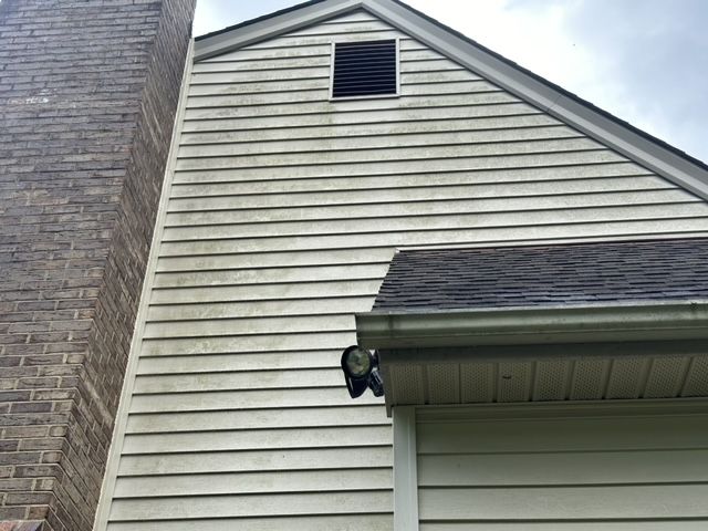 A before photo of a house washing job in Gloucester, VA. 
