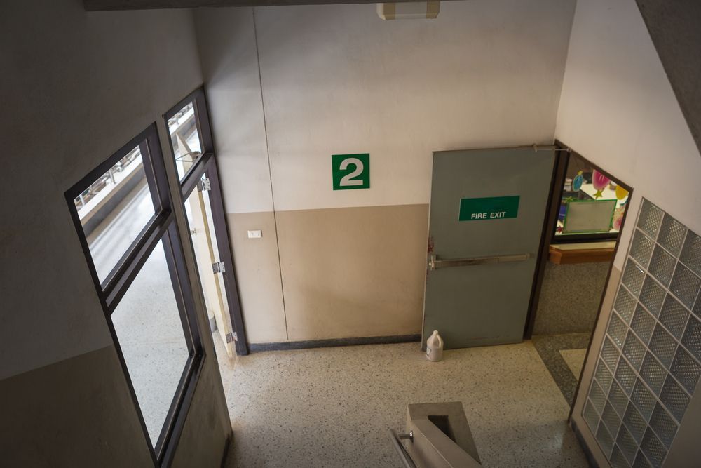 From the Top of Stairs Into a Hallway With Door and Glass Window — Local Glassmaster in Huskisson, NSW
