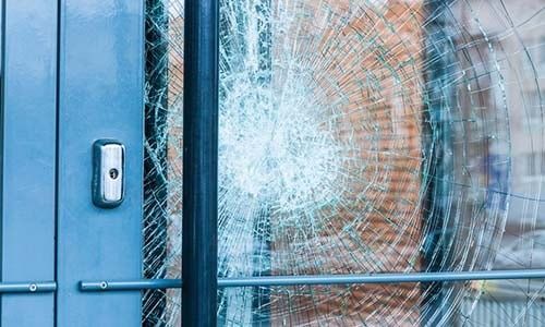 Broken Glass in A Door with Metal Frame — Local Glassmaster in Huskisson, NSW