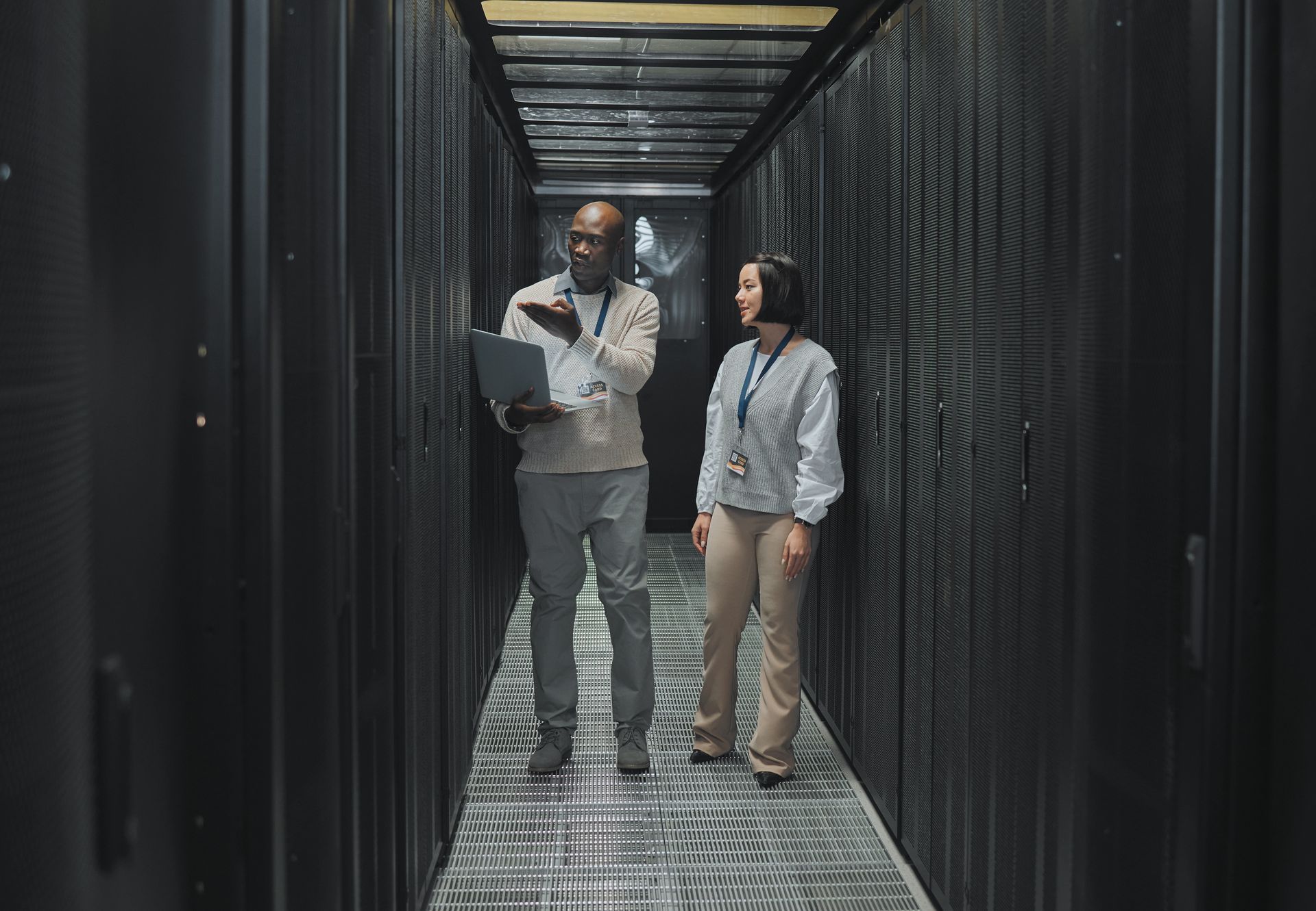 Server room, teamwork or people on laptop for software management, system upgrade or cyber security