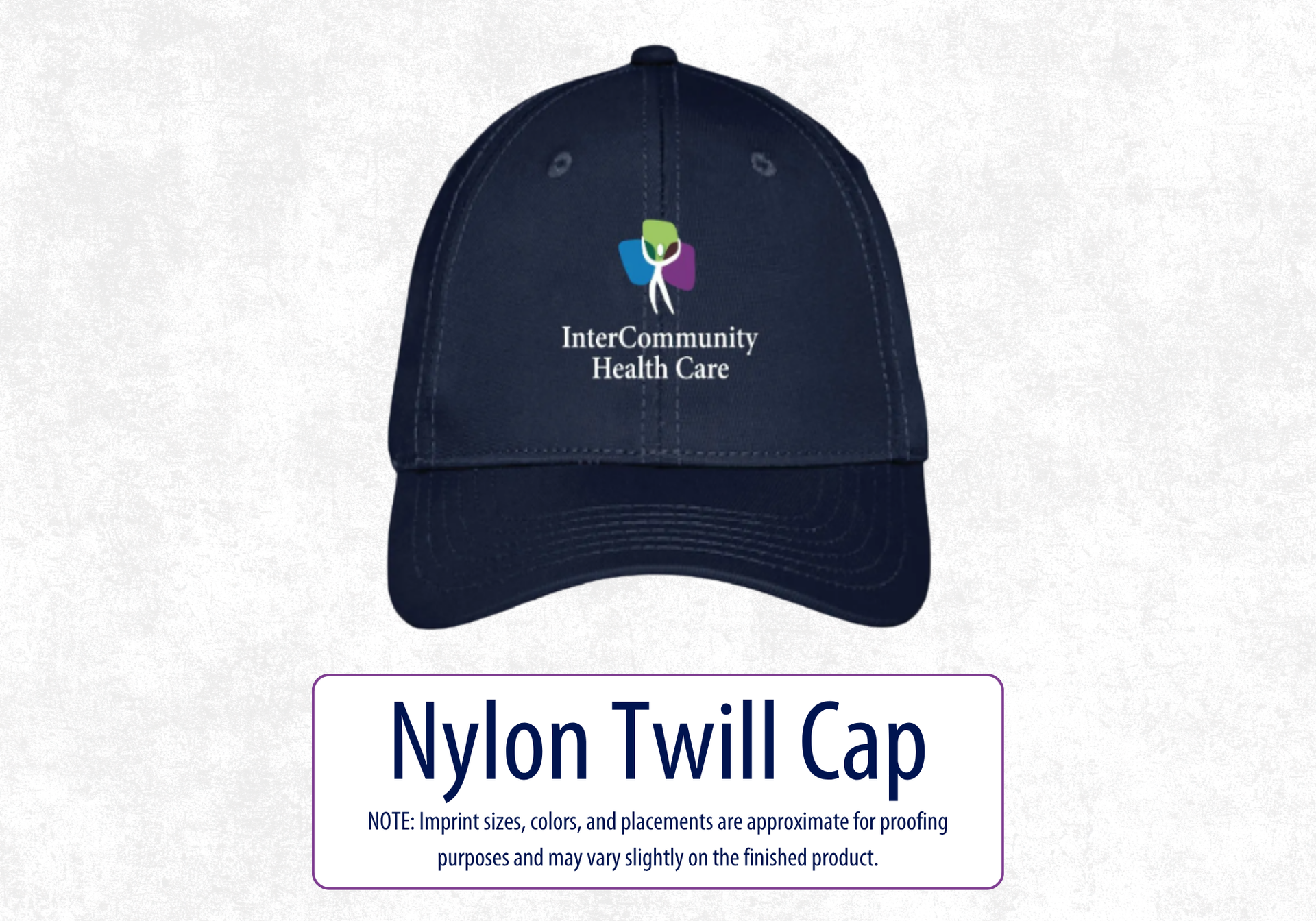 Photo of a navy blue baseball hat with the InterCommunity logo on the front.