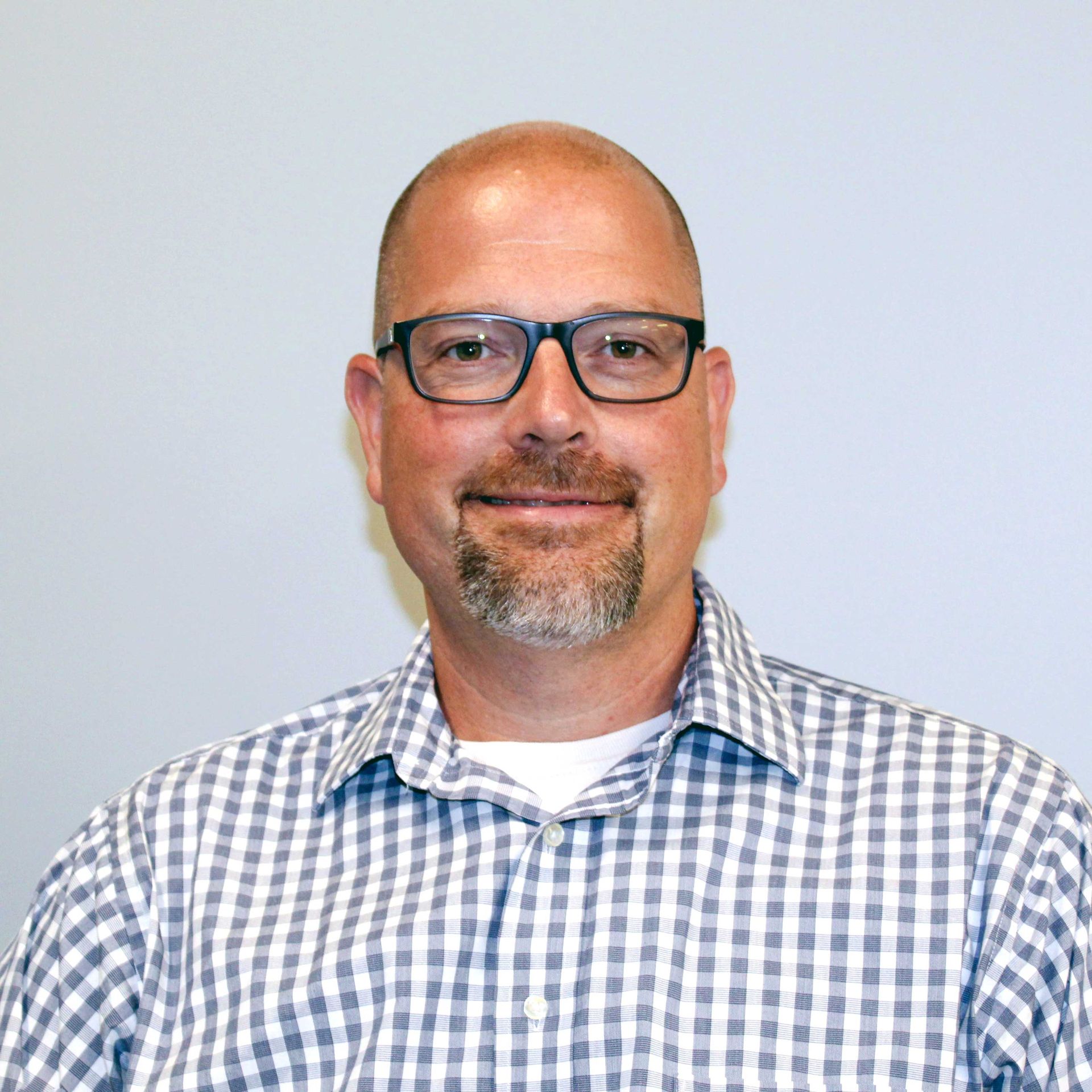 Headshot for staff member, Ryan MacDonough.
