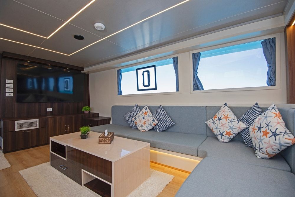 A Living Room On A Boat With A Couch And A Coffee Table — Allwood Upholstery In Manunda, QLD
