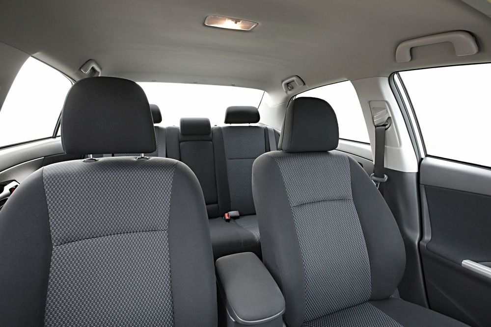 The Inside Of A Car With Gray Seats And A White Background — Allwood Upholstery In Manunda, QLD