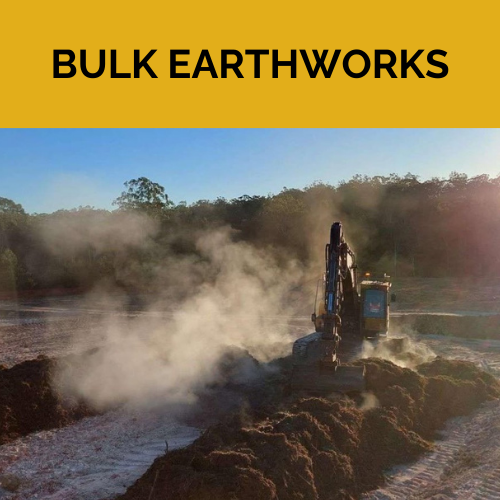 A Spencer Civil & Earthworks  excavator is moving dirt on a cold morning in a field with steam coming out of it.