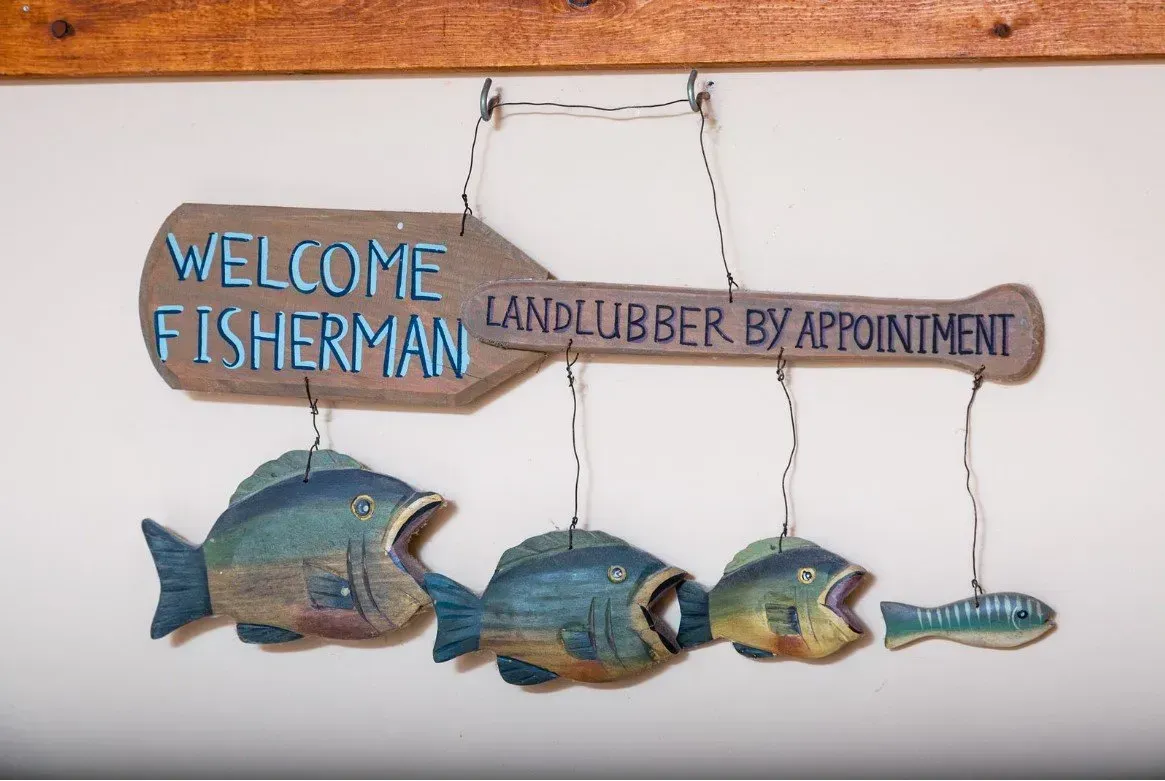 Wooden sign saying