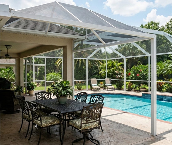 A covered outdoor patio with a dining set overlooking a swimming pool and lush green backyard.