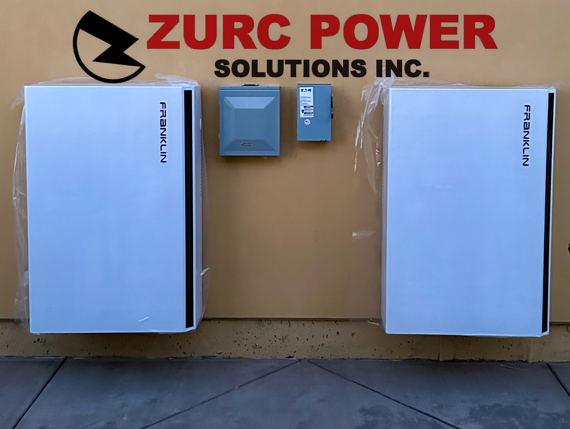 A sign for zurc power solutions inc. hangs on a wall