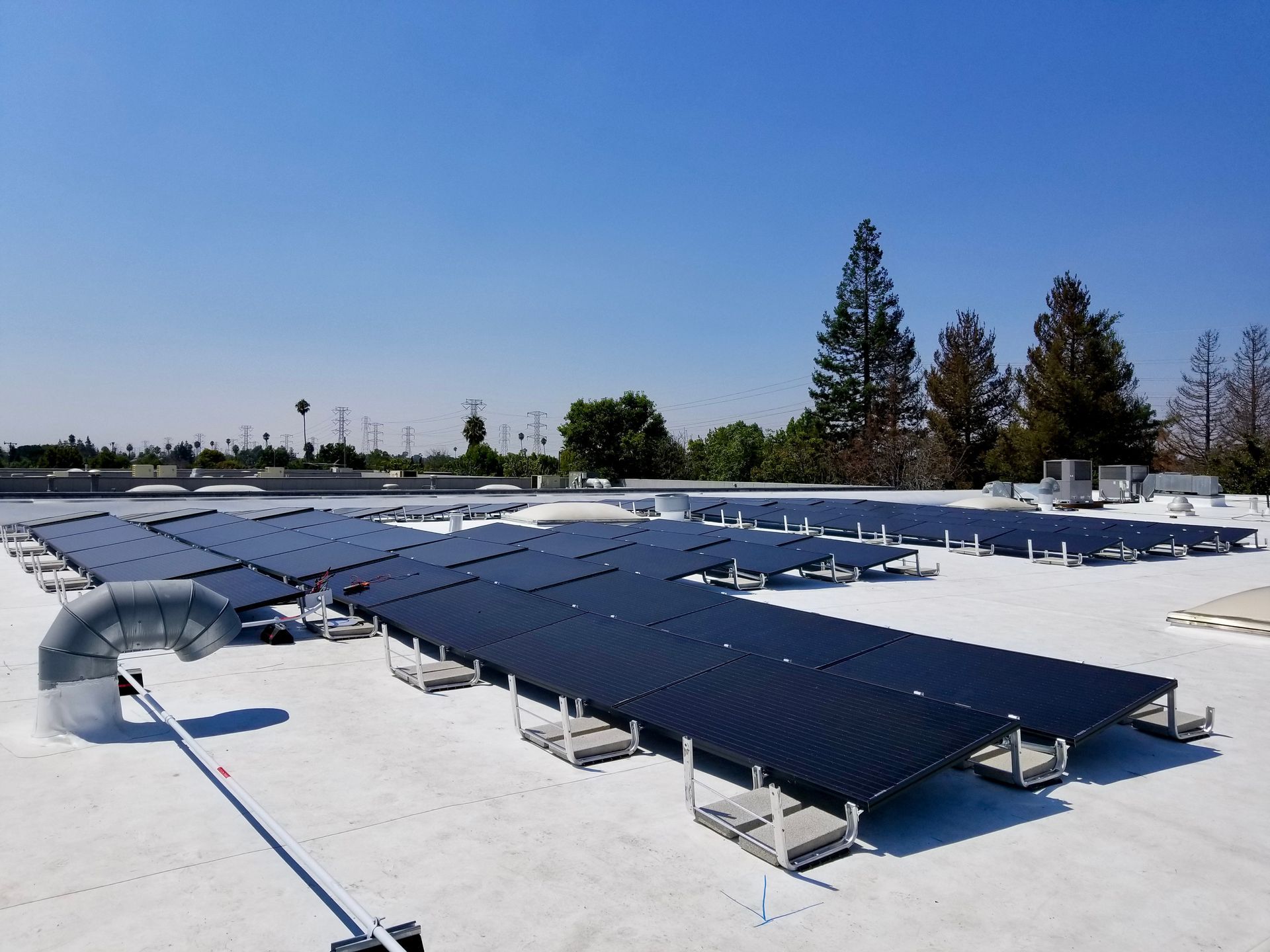 A roof with a lot of solar panels on it