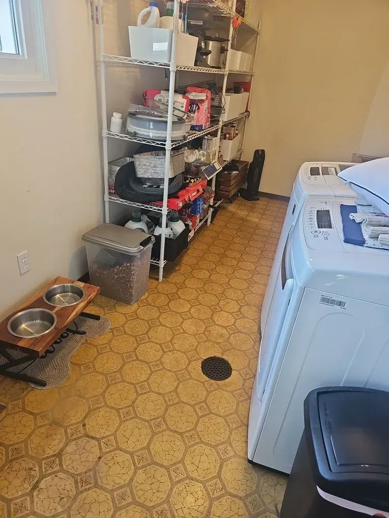 Asbestos-containing material found in laundry room of Chesterfield home before removal