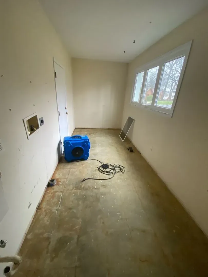 Asbestos removal breakdown complete showing air scrubbers used during abatement