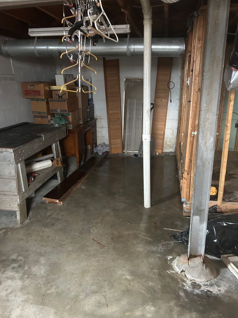 Florissant basement showing fire and smoke damage after a residential fire