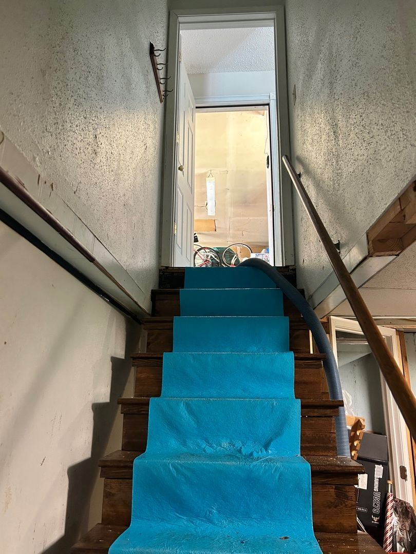 Basement containment barriers installed during water damage restoration in Florissant