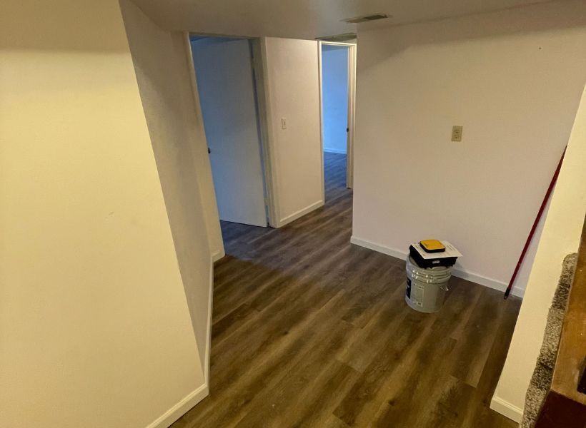 basement hallway after restoration