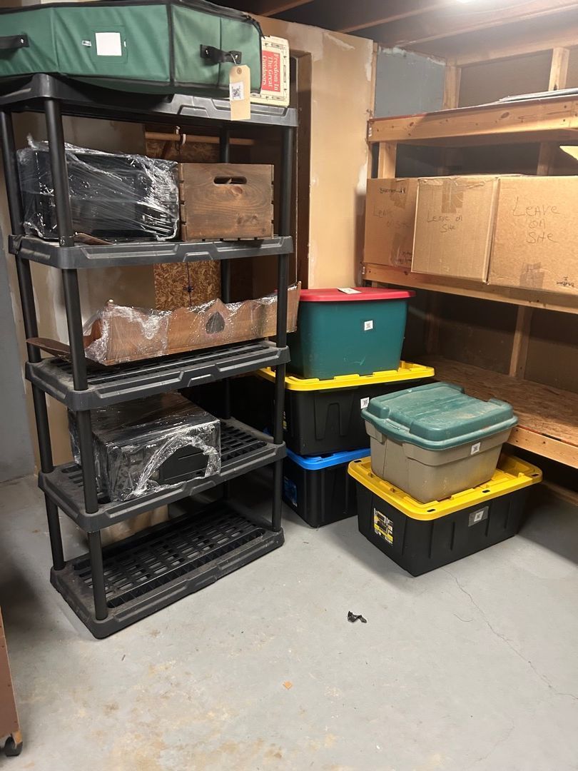 Carefully stored and packed belongings from a water-damaged basement ready for cleaning