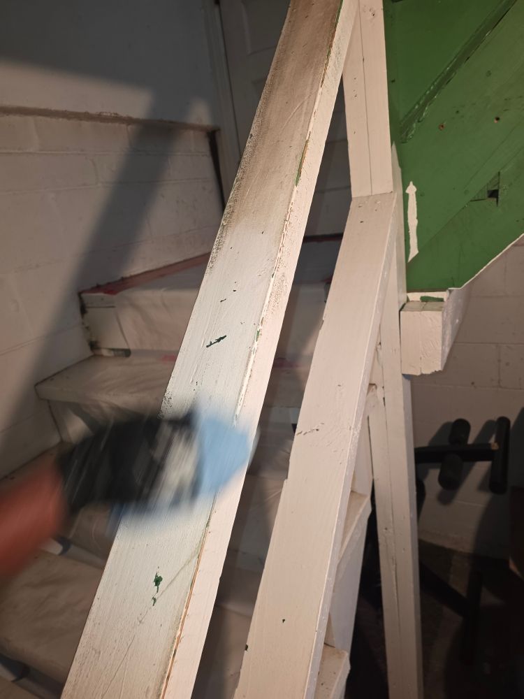 Cleaning smoke-stained handrails after residential fire in Florissant MO