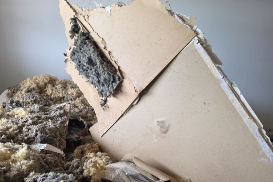 Damaged building materials and debris after a severe storm