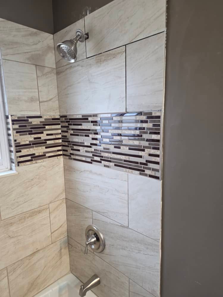 Close view of new tile flooring in the fully restored bathroom