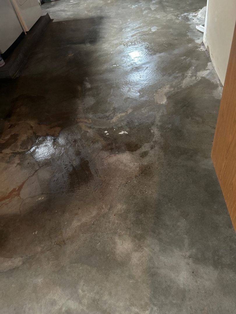 Flooring during smoke and fire damage restoration process in residential basement