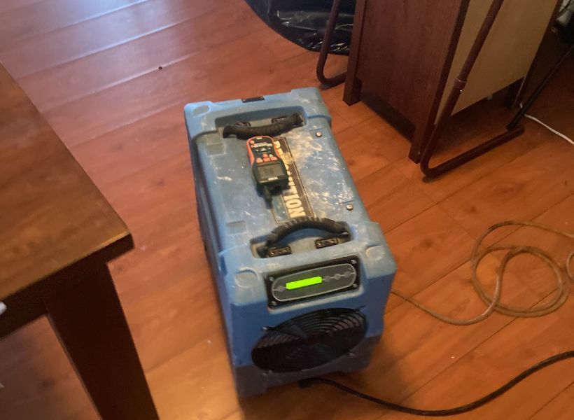 moisture meter and dehumidifier use  in Overland, MO house