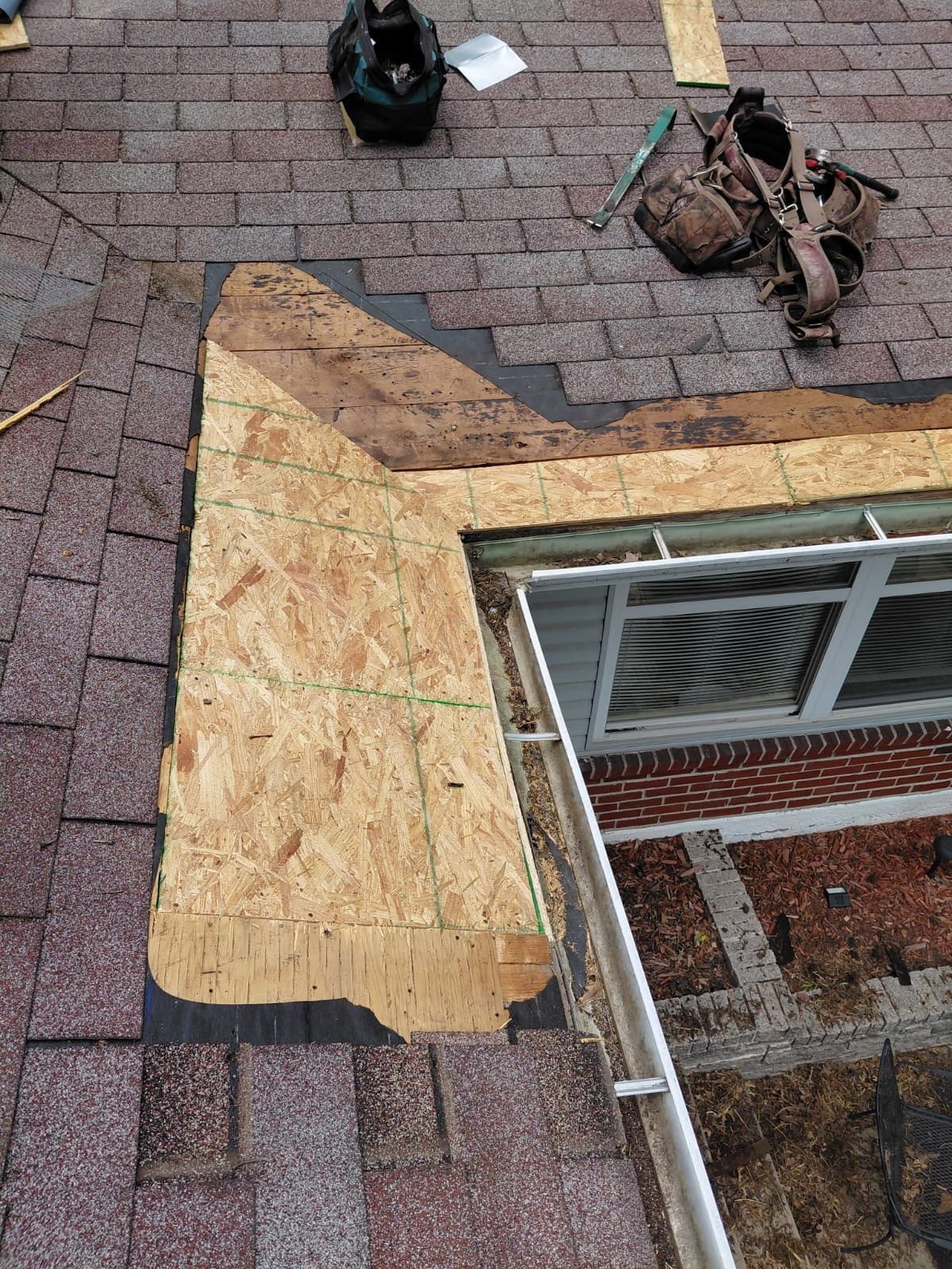 Roof repair during mold remediation in a St. Louis mold-damaged attic