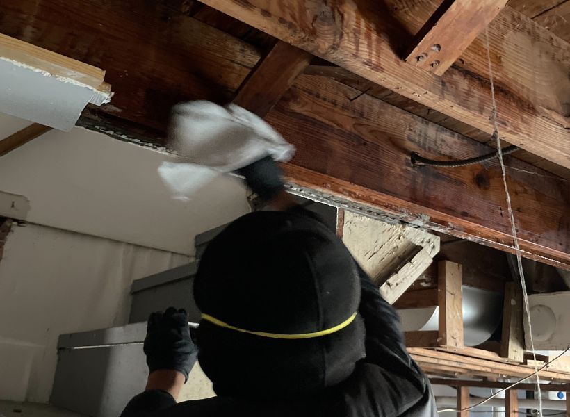 spraying studs basement in Overland, MO