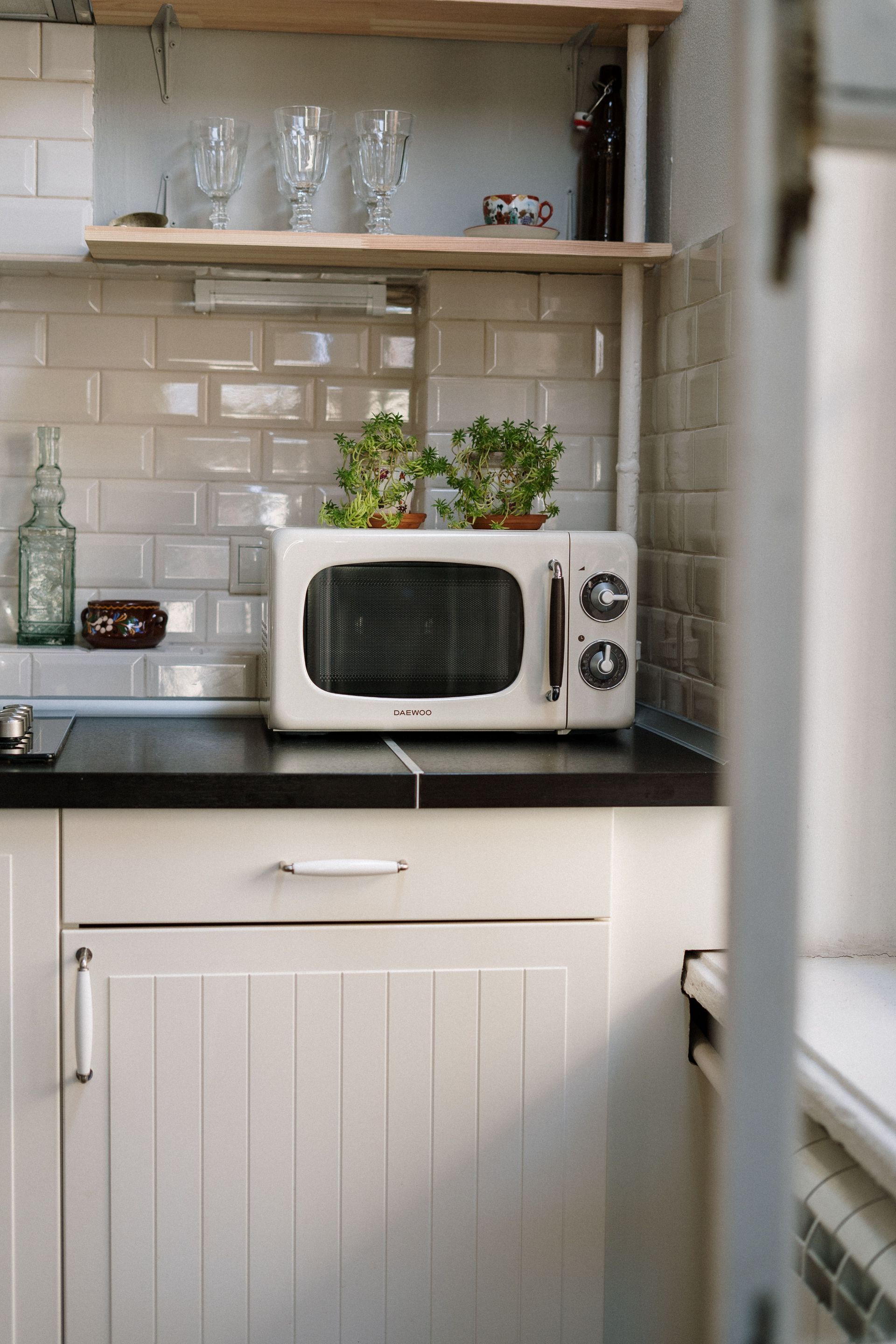 Technician repairing a washing machine drum in a laundry room