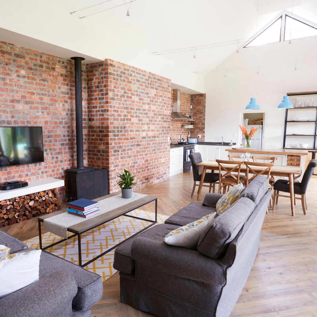 Home with an open concept highlighting the living and dining spaces
